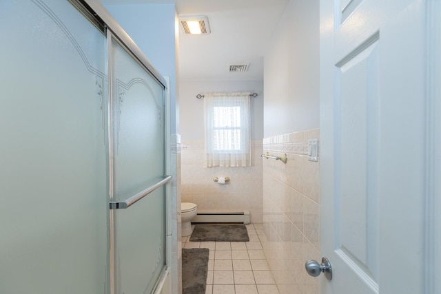 bathroom featuring a baseboard radiator, tile walls, tile patterned flooring, walk in shower, and toilet
