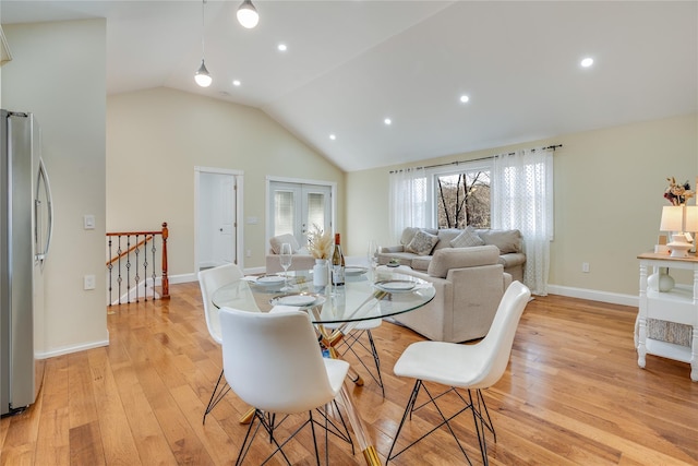 dining area with lofted ceiling, light wood-style flooring, baseboards, and recessed lighting