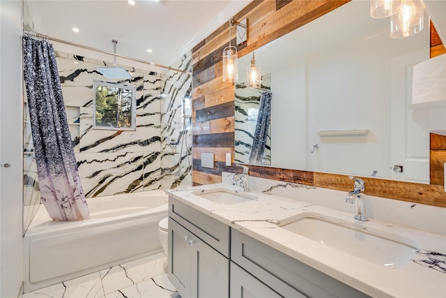 full bathroom with vanity, ornamental molding, shower / tub combo with curtain, and toilet