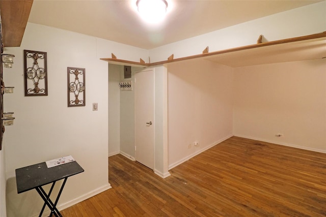 interior space with dark hardwood / wood-style floors