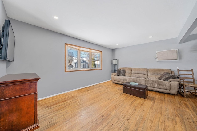 living room with light hardwood / wood-style floors