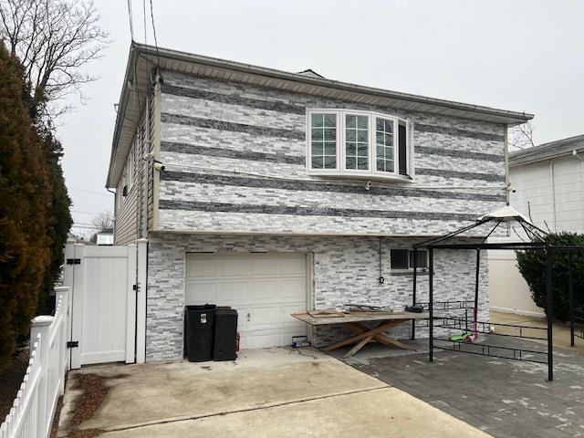 view of home's exterior with a garage