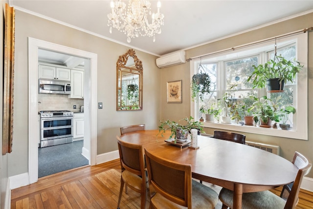 dining area featuring a chandelier, a wall mounted AC, light wood-type flooring, and crown molding