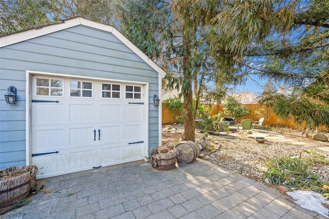 garage featuring driveway