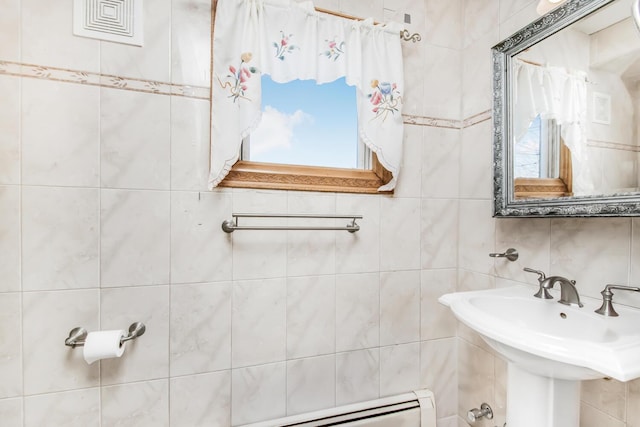 half bathroom with backsplash, a wealth of natural light, and tile walls