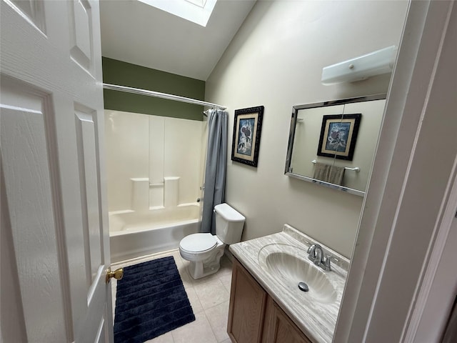 full bathroom with shower / bath combo, toilet, lofted ceiling with skylight, tile patterned flooring, and vanity