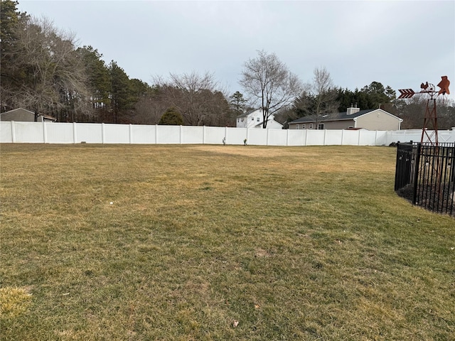 view of yard with fence