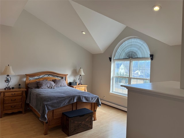 bedroom with light wood-type flooring, a baseboard heating unit, vaulted ceiling, and recessed lighting