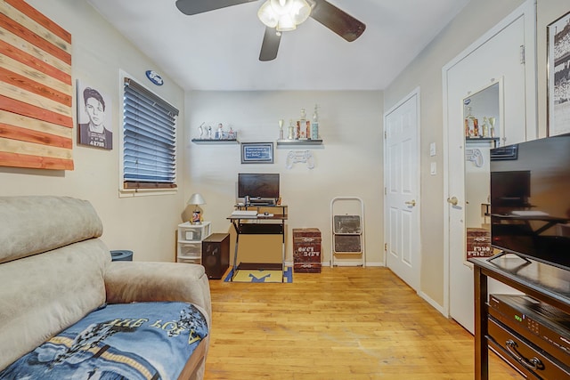 interior space with ceiling fan and light wood-type flooring