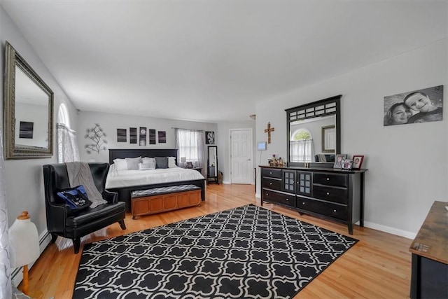 bedroom with wood-type flooring