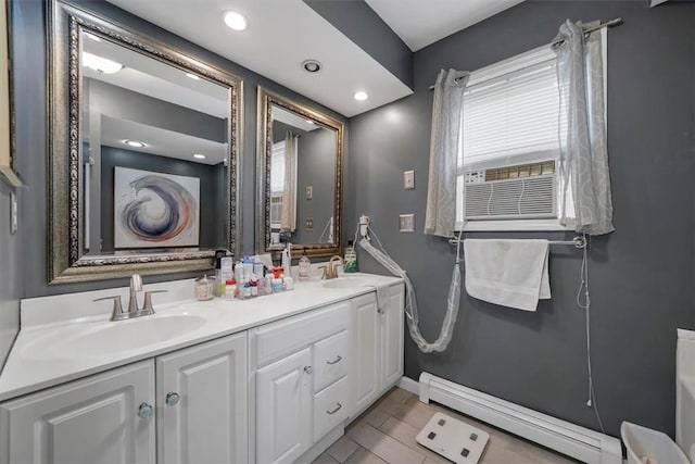 bathroom featuring vanity and a baseboard radiator