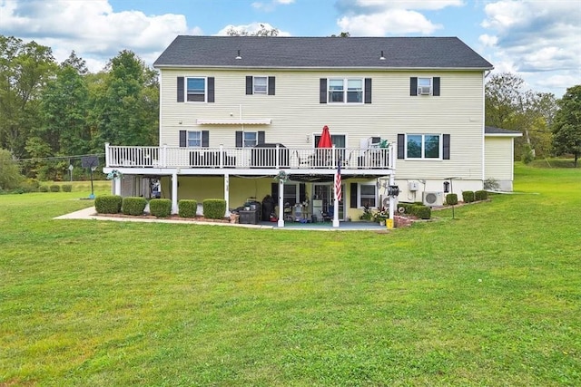 rear view of property with a wooden deck, ac unit, a yard, and a patio area