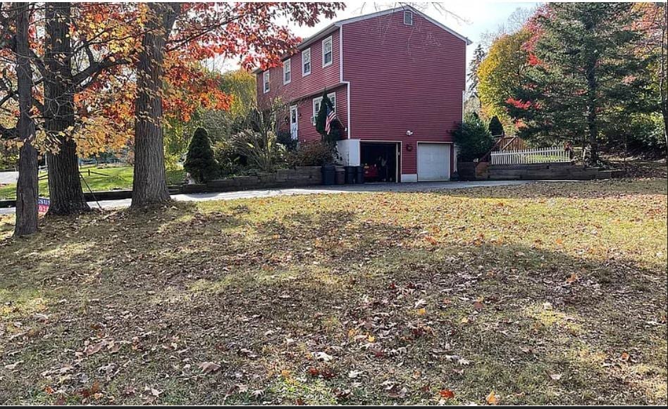 view of yard featuring a garage