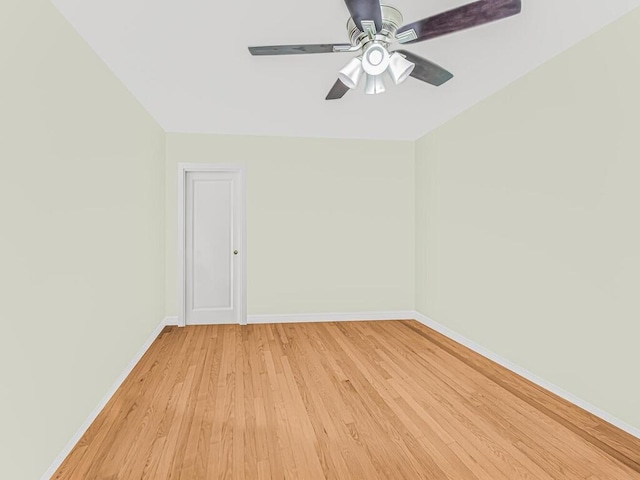 spare room featuring ceiling fan and light hardwood / wood-style flooring