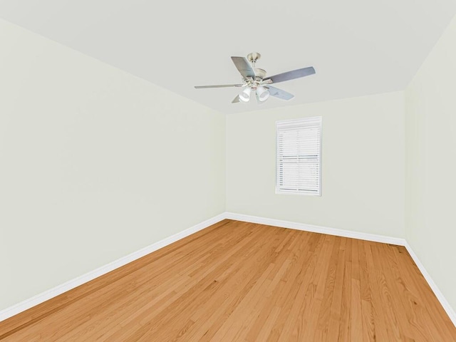 empty room with wood-type flooring and ceiling fan