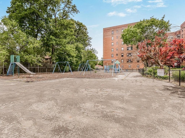 view of property's community featuring a playground