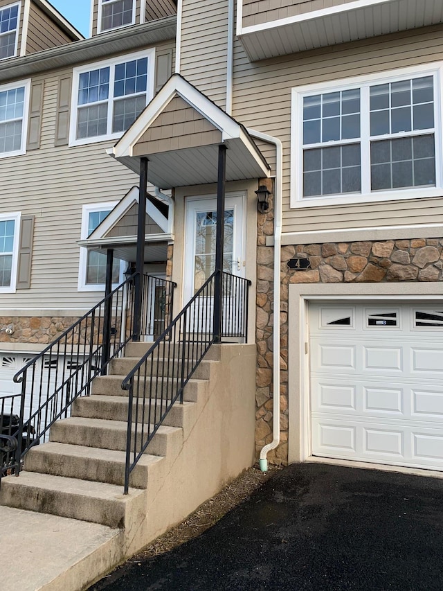 entrance to property with a garage