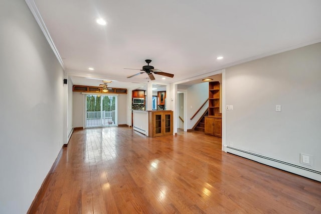 unfurnished living room featuring a baseboard radiator, ornamental molding, ceiling fan, and light hardwood / wood-style flooring