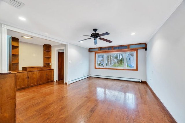 unfurnished living room with a baseboard heating unit, ceiling fan, crown molding, and light wood-type flooring