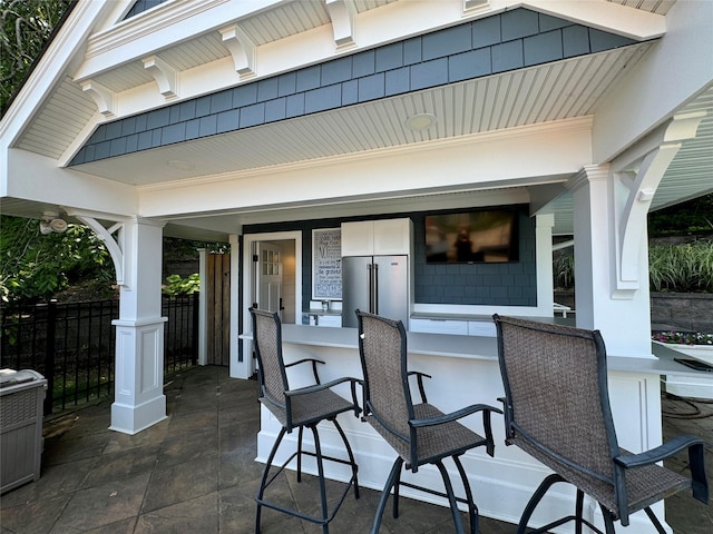 view of patio / terrace with a bar