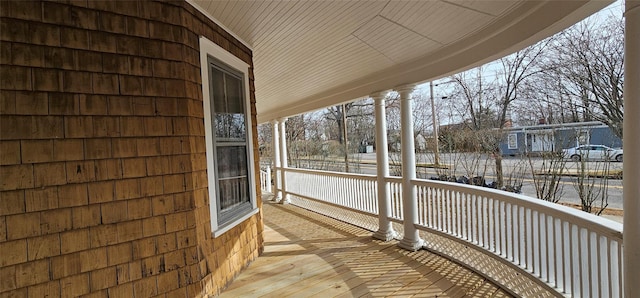 view of snow covered deck