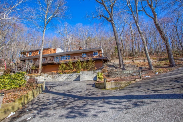 view of front of house with a deck