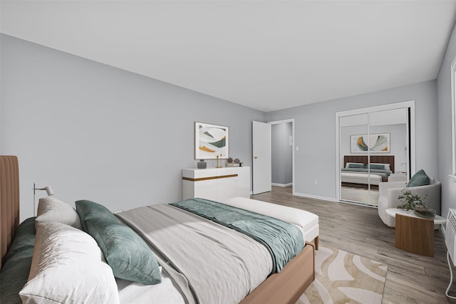 bedroom with wood-type flooring