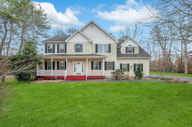 view of front facade featuring a porch and a front lawn