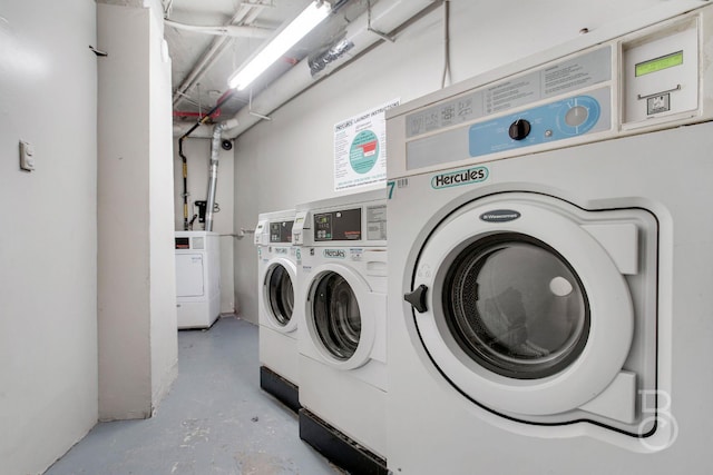 laundry room with washer and dryer