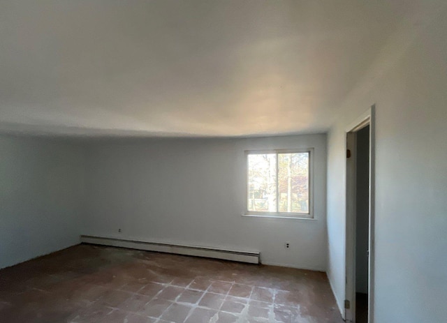 spare room featuring a baseboard radiator