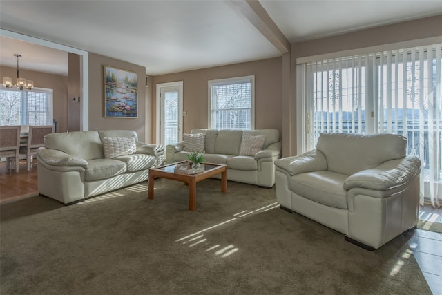 living room featuring a chandelier