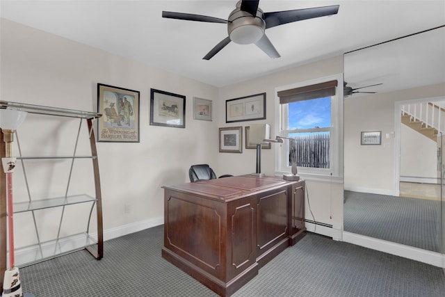 carpeted office space with ceiling fan and baseboard heating