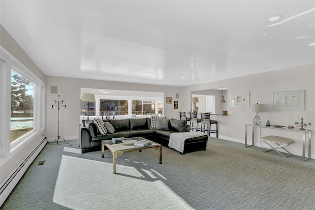 living room featuring a baseboard radiator and carpet flooring