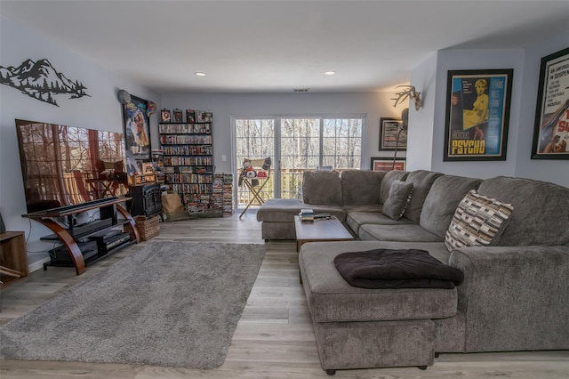 living room with light hardwood / wood-style floors