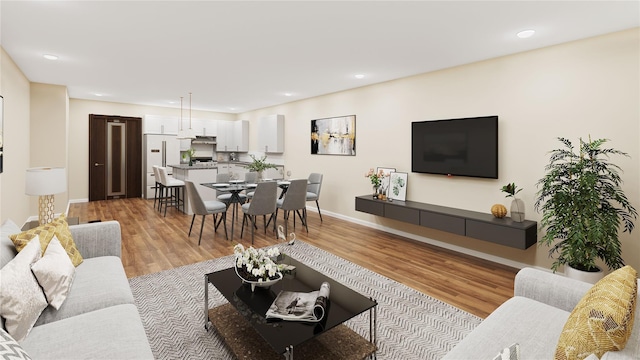 living room with light hardwood / wood-style flooring