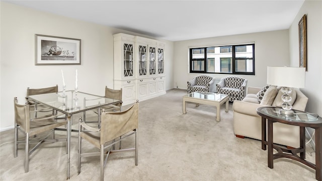 living room featuring light colored carpet