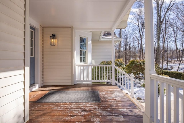 view of snow covered deck