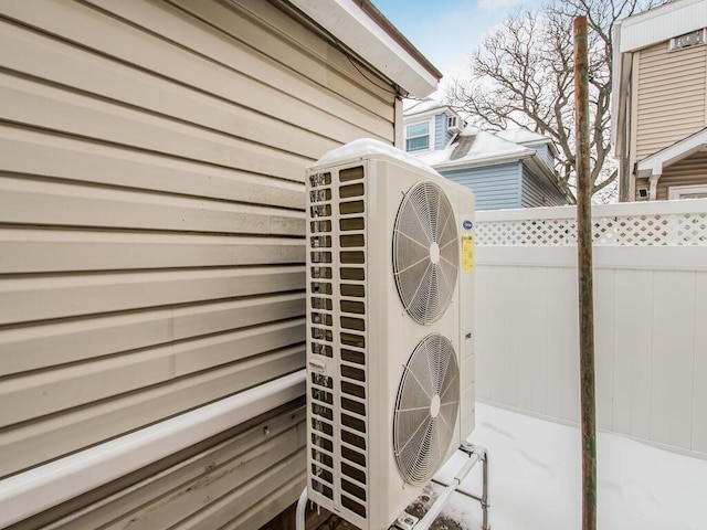 exterior space featuring fence and ac unit