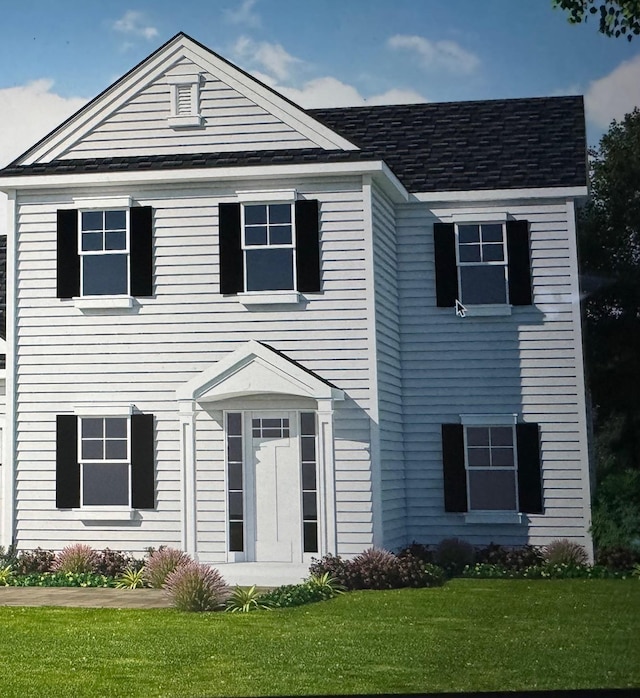 view of front of home featuring a front yard