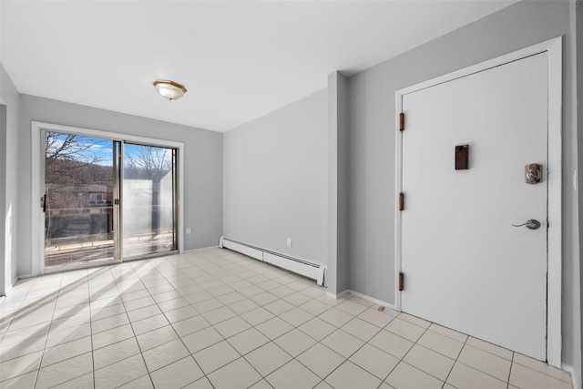 unfurnished room featuring a baseboard radiator and light tile patterned flooring