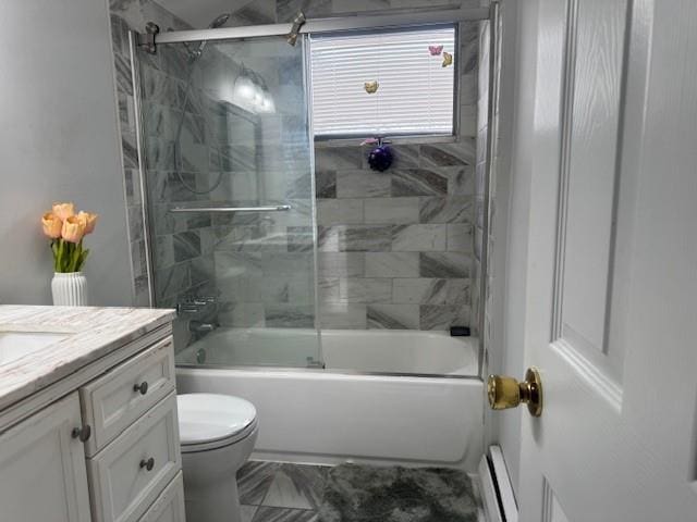 full bathroom with vanity, shower / bath combination with glass door, and toilet