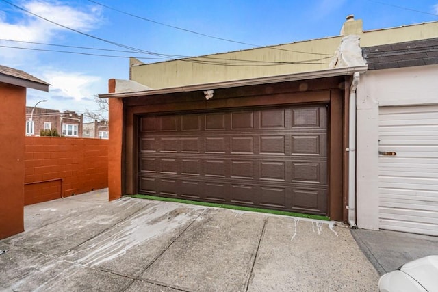 detached garage with fence