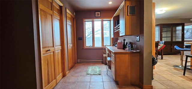 581 Hessinger Lare Rd, Jeffersonville, NY 12748 - doorway featuring a baseboard heating unit, light tile patterned floors, and recessed lighting