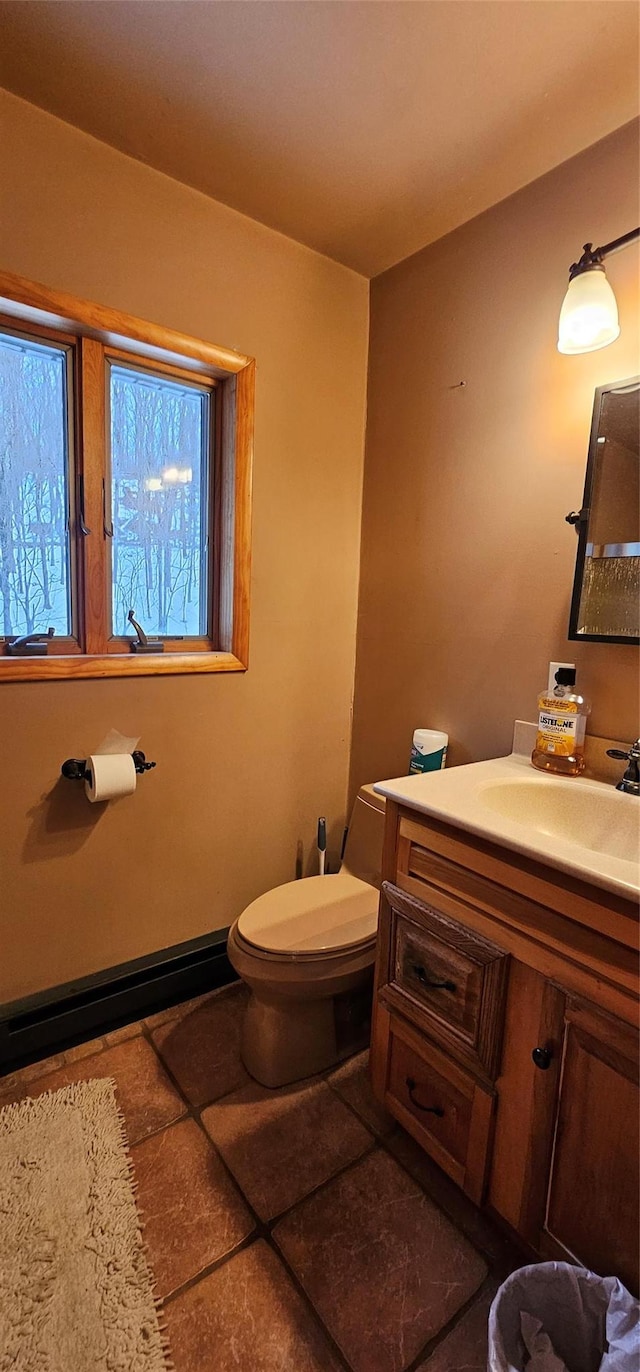 581 Hessinger Lare Rd, Jeffersonville, NY 12748 - half bathroom featuring vanity and a baseboard radiator