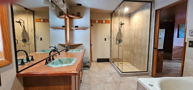 581 Hessinger Lare Rd, Jeffersonville, NY 12748 - full bathroom featuring a stall shower, vanity, a tub, and tile patterned floors