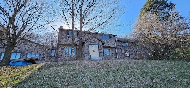 581 Hessinger Lare Rd, Jeffersonville, NY 12748 - view of front of property with stone siding, a chimney, and a front lawn