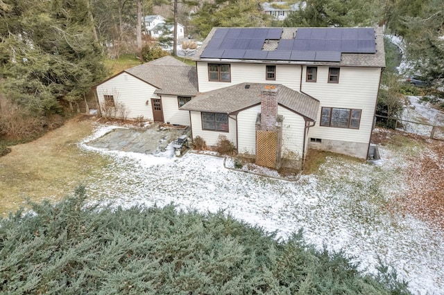 view of front of home with solar panels