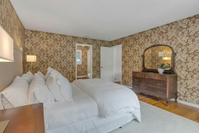 bedroom with wood-type flooring