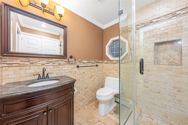 bathroom featuring tile walls, vanity, ornamental molding, toilet, and walk in shower