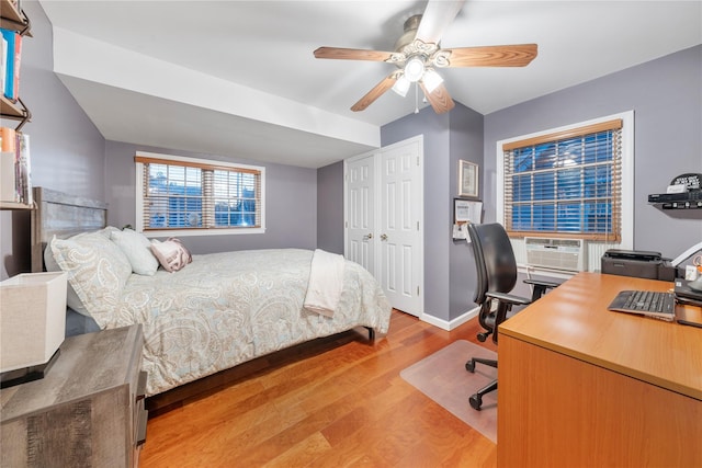 bedroom featuring ceiling fan and light hardwood / wood-style floors